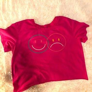 Hot pink smiley face crop top tee